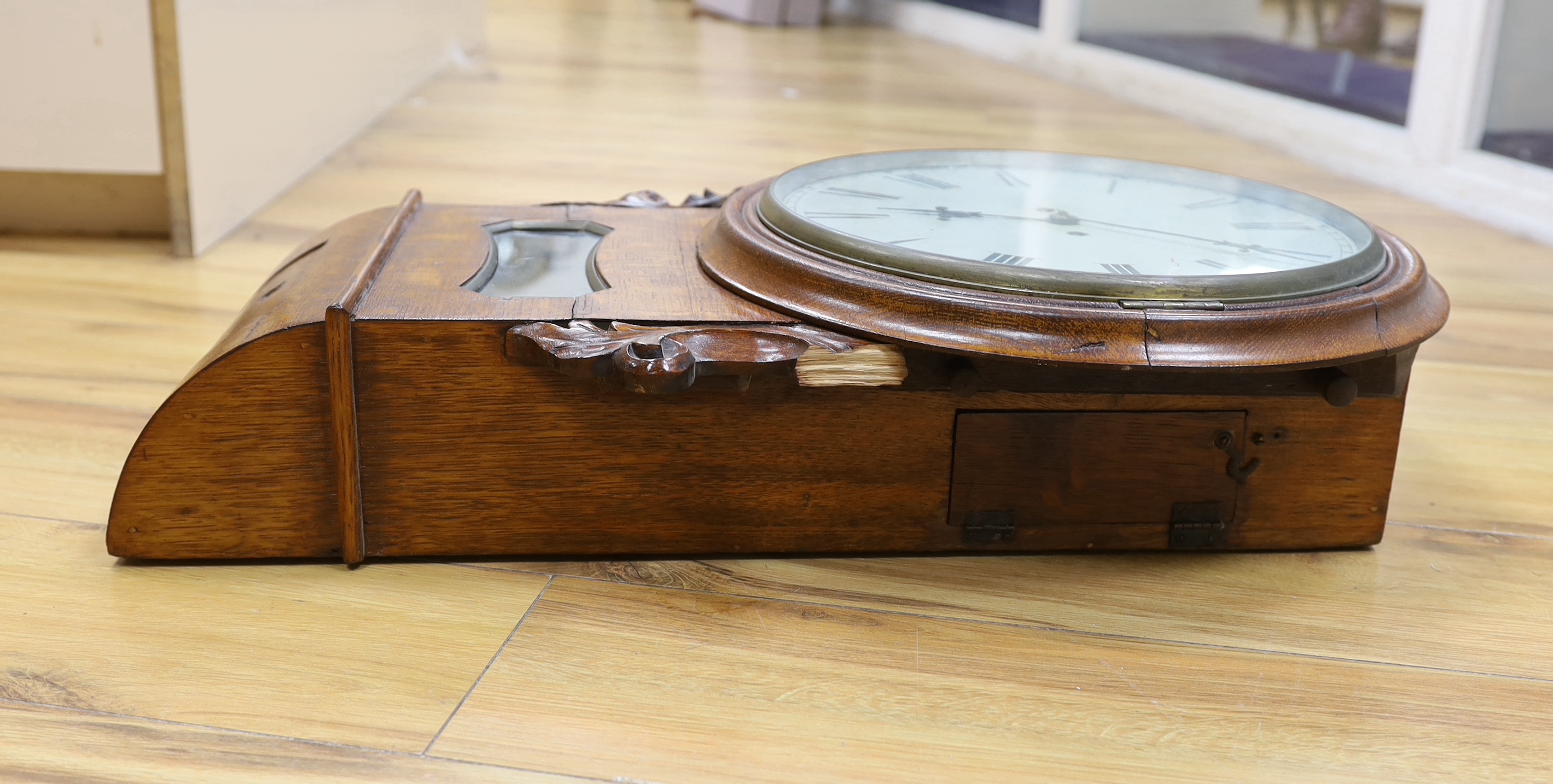 A 19th century oak eight day drop dial wall clock, with twin fusee movement, 65cm